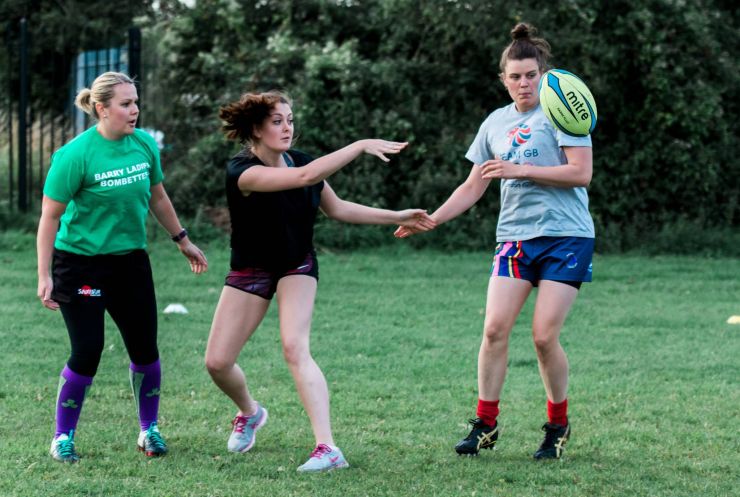 kevin moore photographer captures team members of the barry ladies rfc passing the ball