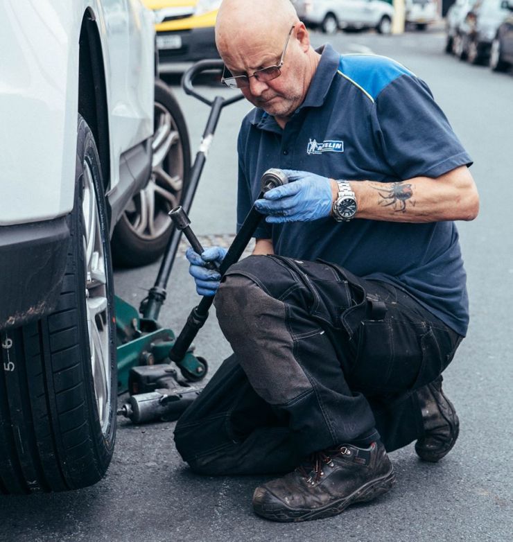 kevin moore captures stuart kirke from barry tyre centre preparing to removal a customer ageing tyre