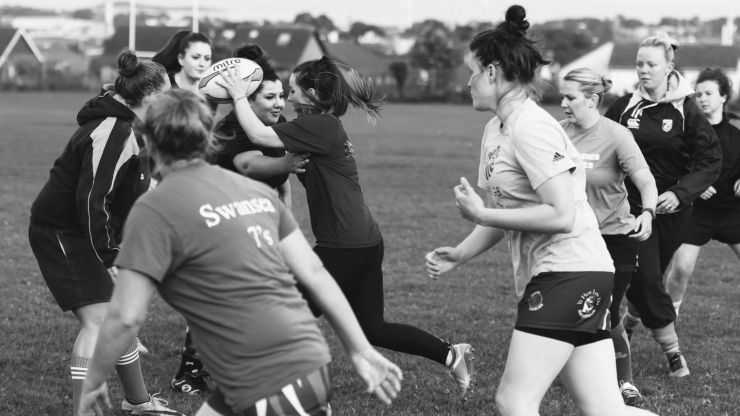 kevin moore photographer captures team members of the barry ladies rfc player running with the ball