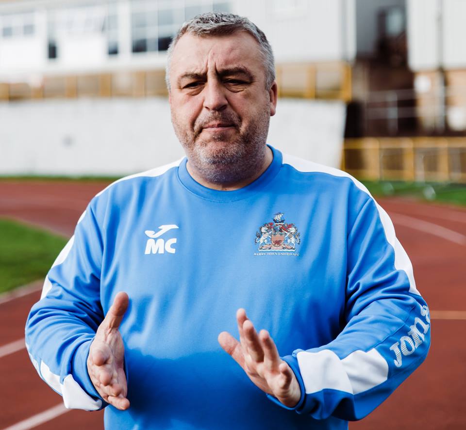 The coach applauds the team.