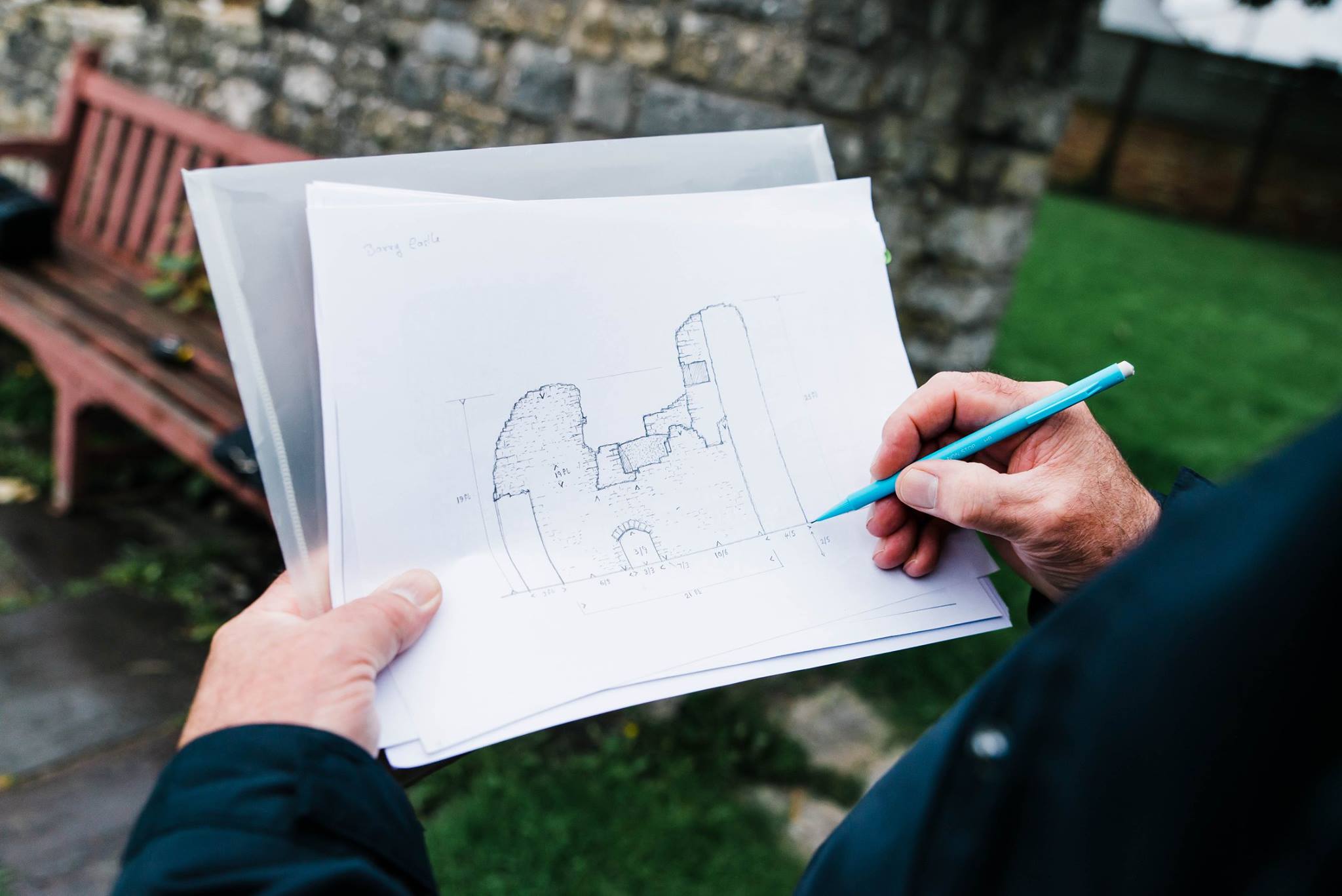 kevin moore photographer captures archaeologist gareth tyley checking scale and measuring before making a scaled model of barry castle