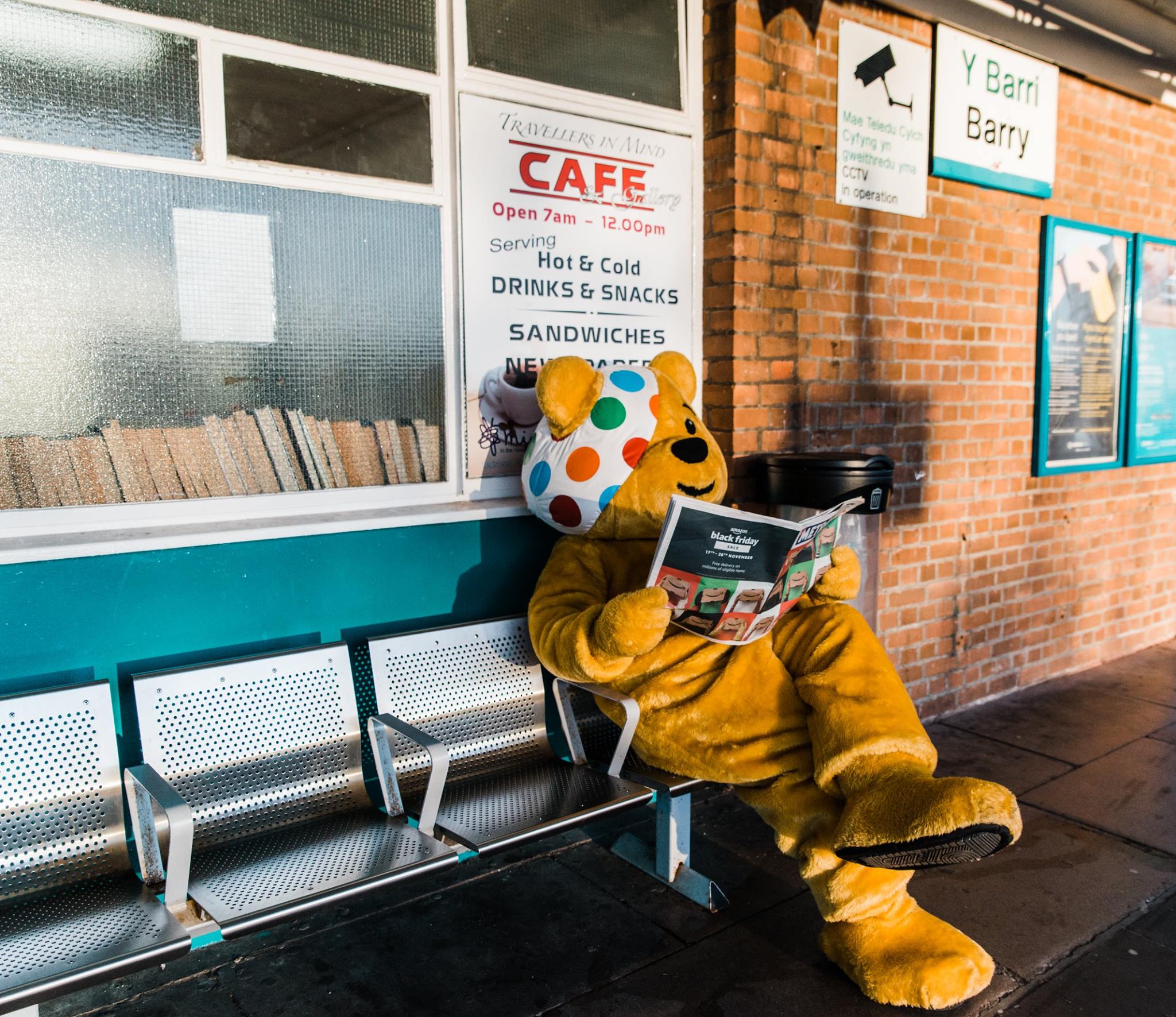 Pudsey Bear waiting for metro.