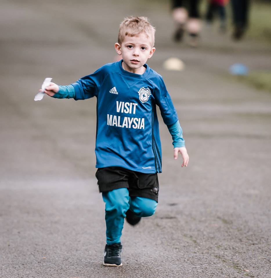 Young boy running.