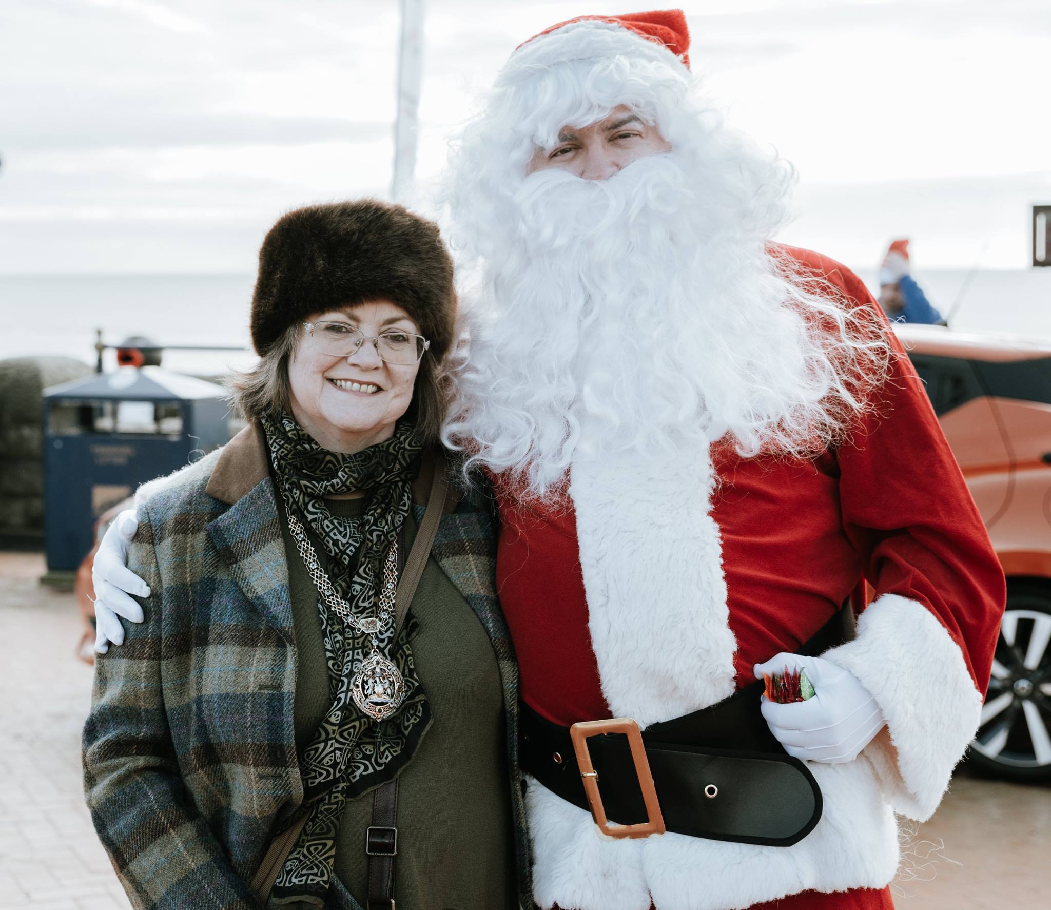 Santa Claus and lady.