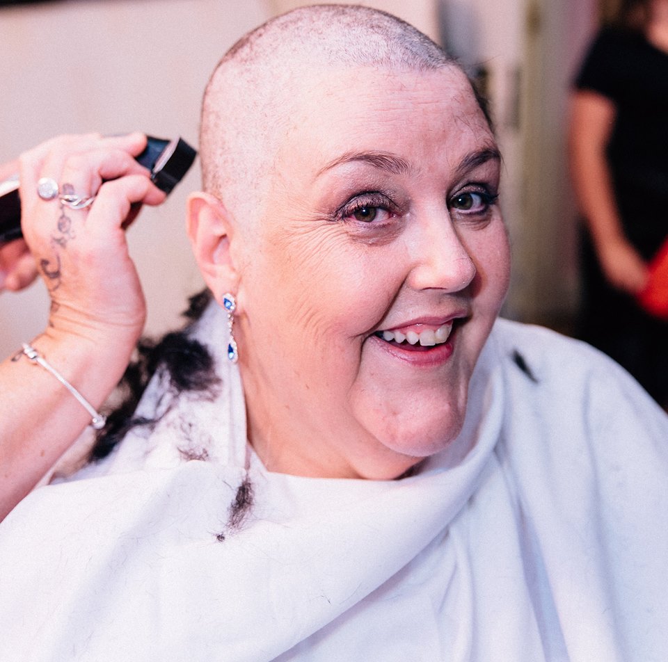 Pamela Dungey shaving the hair.