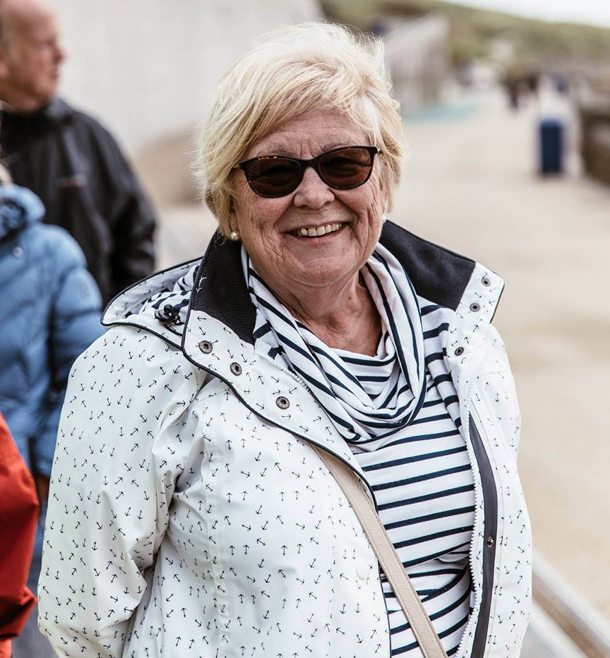 Woman smiling.