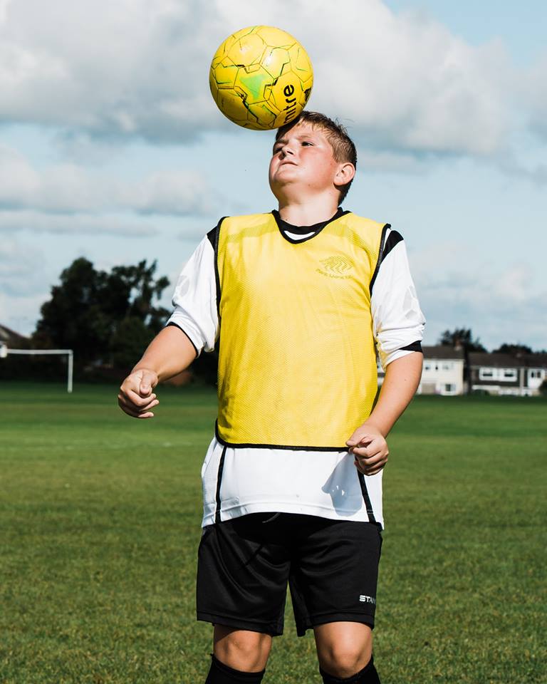 Player controlling the ball with his head.