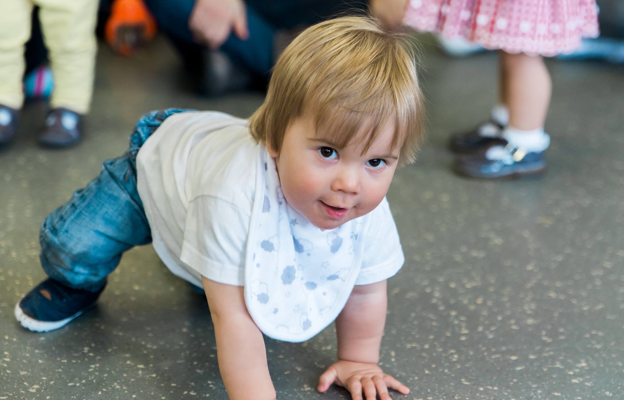 Child getting up from the ground.