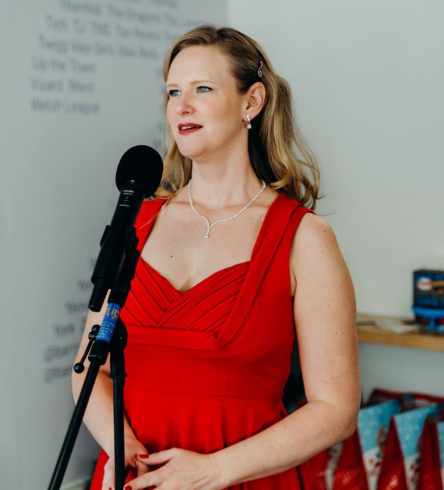 Lady doing a speech.